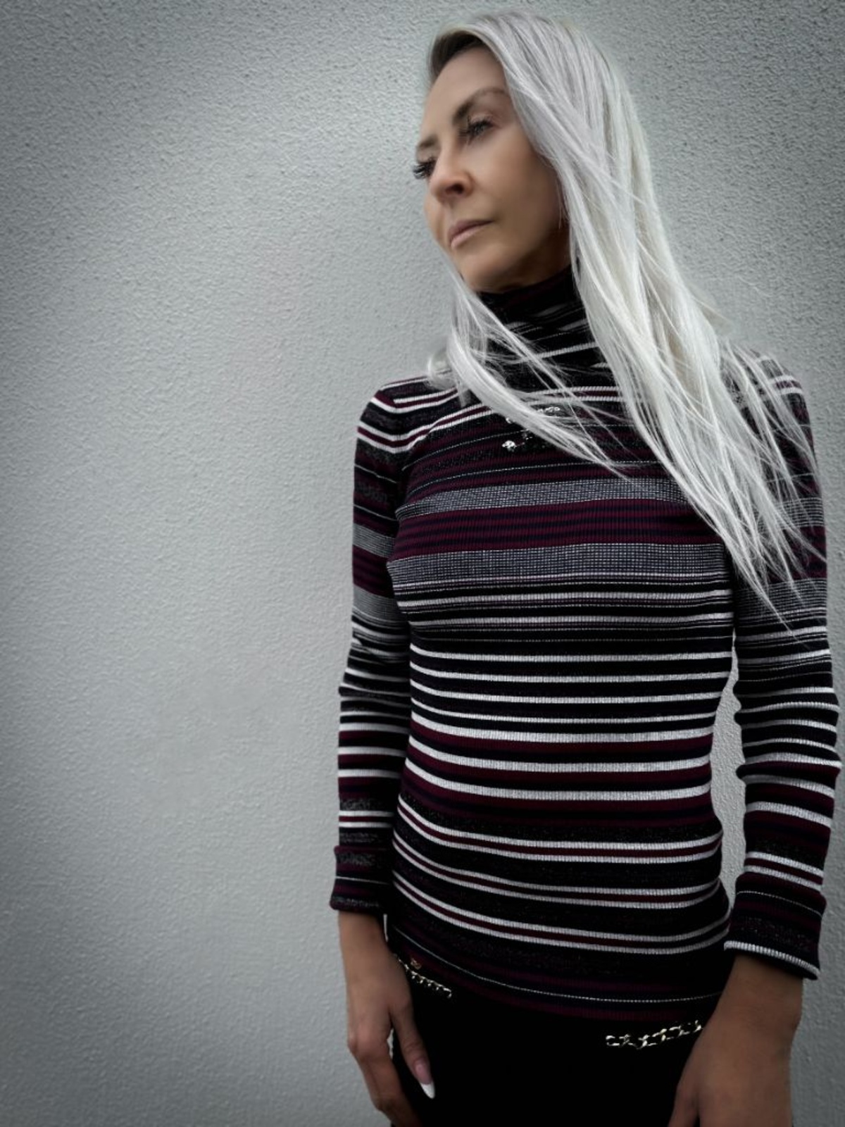Lee Davies — striped turtleneck knit and Chanel chain belt · counsel